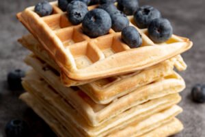 Stack of waffles with blueberries