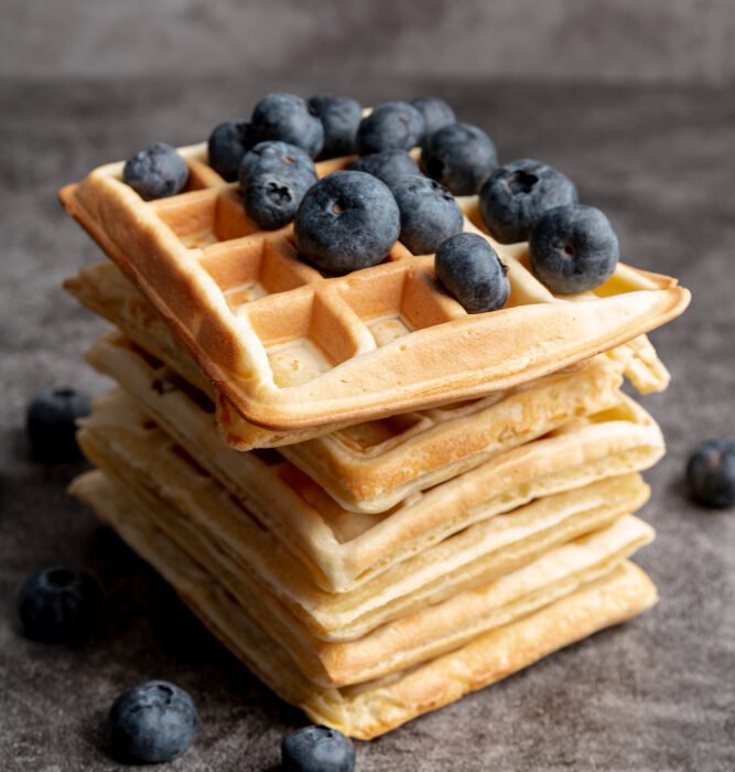 Stack of waffles with blueberries