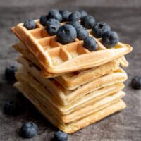 Stack of waffles with blueberries